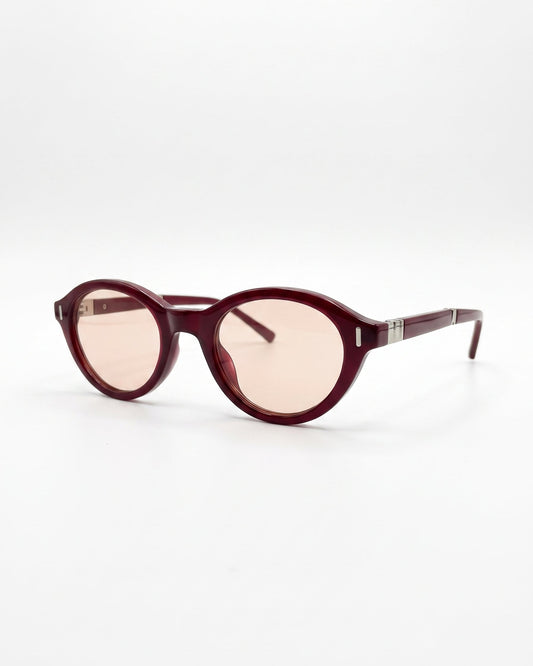 Oval sunglasses with a translucent dark burgundy frame and light pink lenses, find eyewear - oval sunglasses with comfort frame نظاره شمسيه حريمي بأحسن أسعار